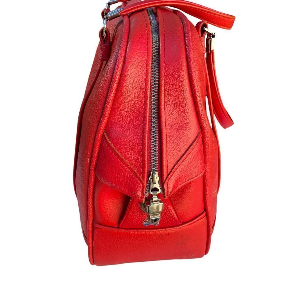 American Tourister Red Travelling Bag